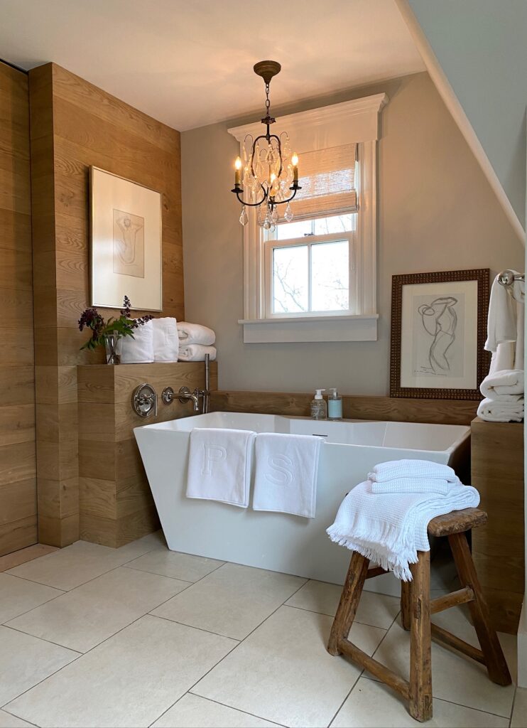 bathroom renovation soaking tub with wood surround