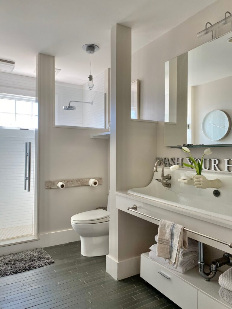 Kids bathroom with a modern mix with vintage art studio sink